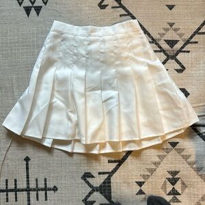 Pleated white skirt. Only worn once. Size xs
